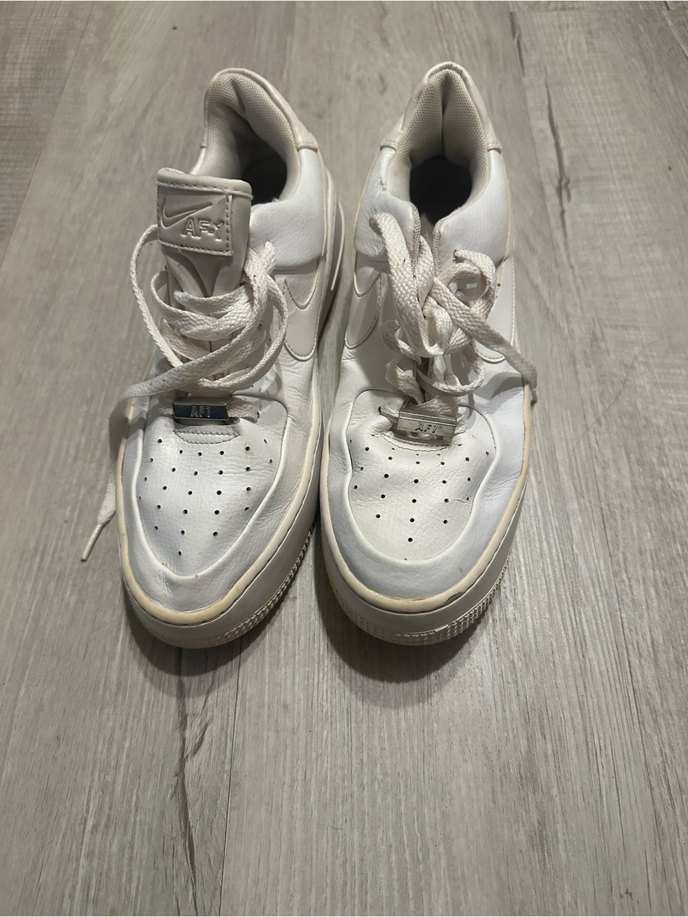 Nike Air Force 1 All-White Leather Sneakers